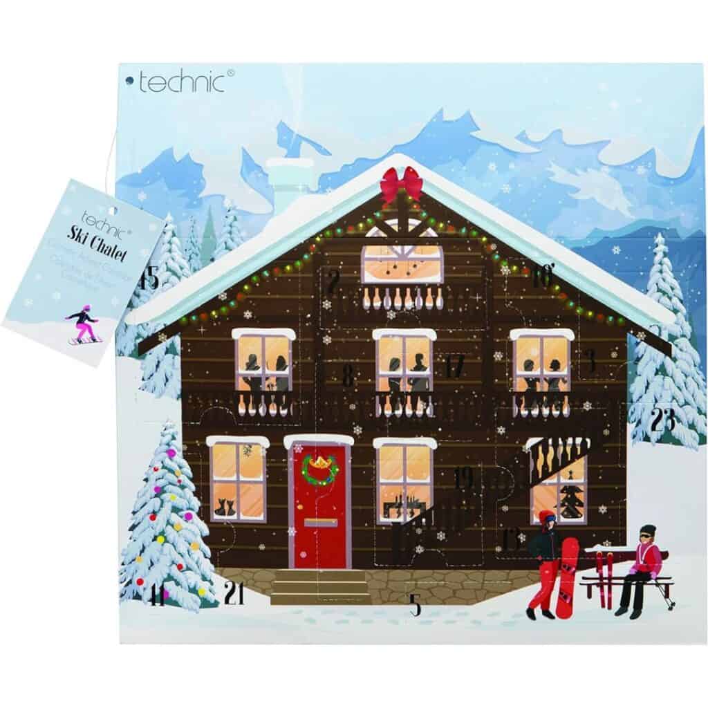 A chalet-shaped advent calendar by Technic, with a snowy mountain background and a cozy brown cabin illustration featuring numbered windows and festive scenes inside, plus skiers outside the front door.