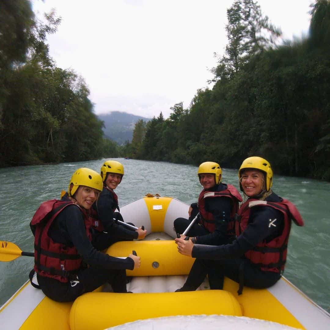 Group enjoying a white water rafting trip with AN Rafting on the Isère River near La Plagne, French Alps.