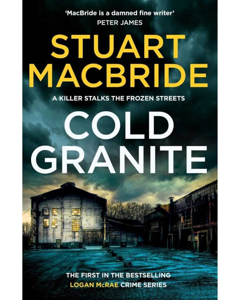 Book cover for Cold Granite by Stuart MacBride, showing an ominous industrial building lit by yellow windows beneath a stormy green sky. The tagline reads, "A killer stalks the frozen streets," and it’s the first in the Logan McRae crime series.