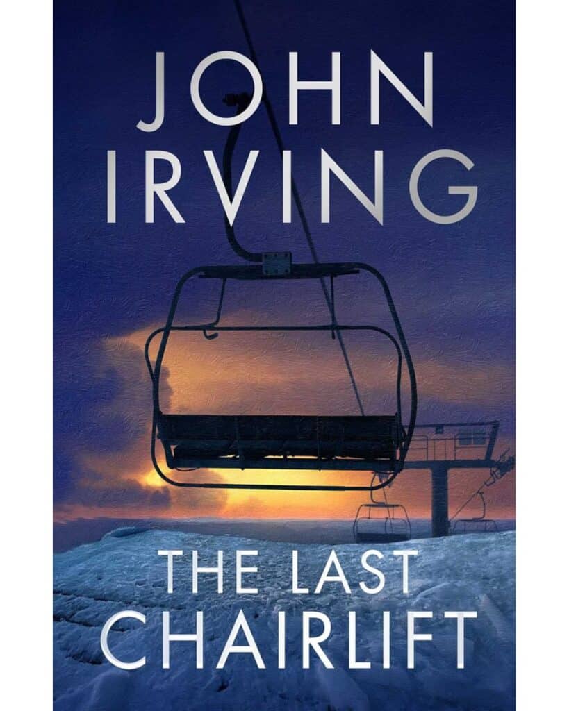 Book cover for The Last Chairlift by John Irving, with a dark silhouette of an empty ski lift suspended above a snowy slope at sunset. The dramatic sky glows orange and purple behind the title text.
