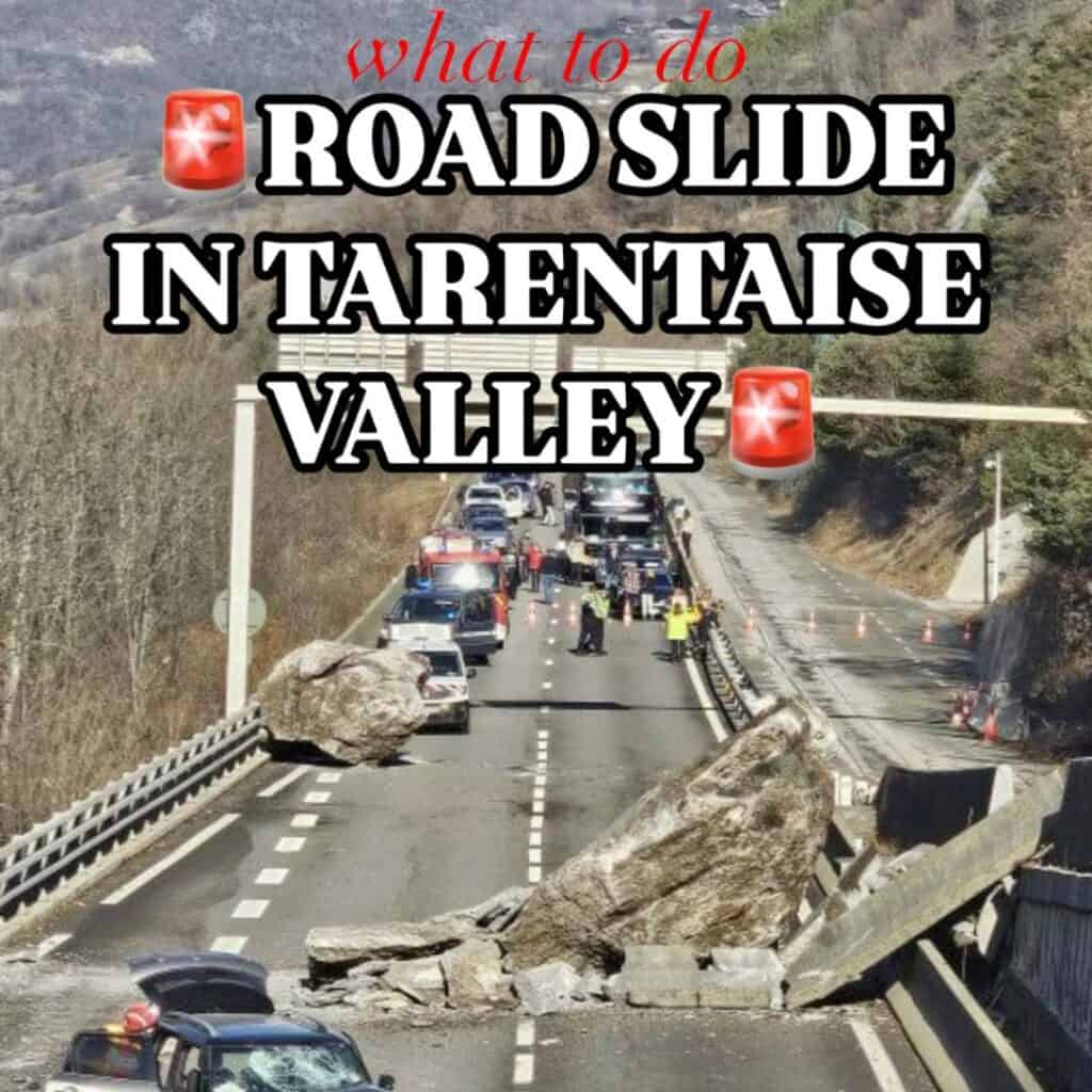 Large boulders block a highway in the Tarentaise Valley following a rockslide, with emergency vehicles and personnel responding at the scene. Overlay text reads “🚨What to do: Road Slide in Tarentaise Valley🚨,” warning travelers of the incident and potential disruptions.