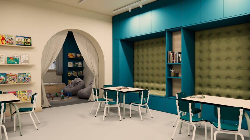Kids’ playroom at Hotel Graciosa, La Plagne, with books, toys, and cozy seating, offering VIP SKI families a fun and colorful indoor space for children.