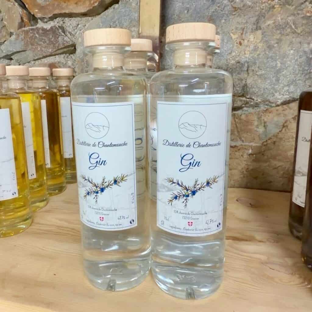Bottles of locally produced gin made by Distillerie de Chantemouche near La Plagne.