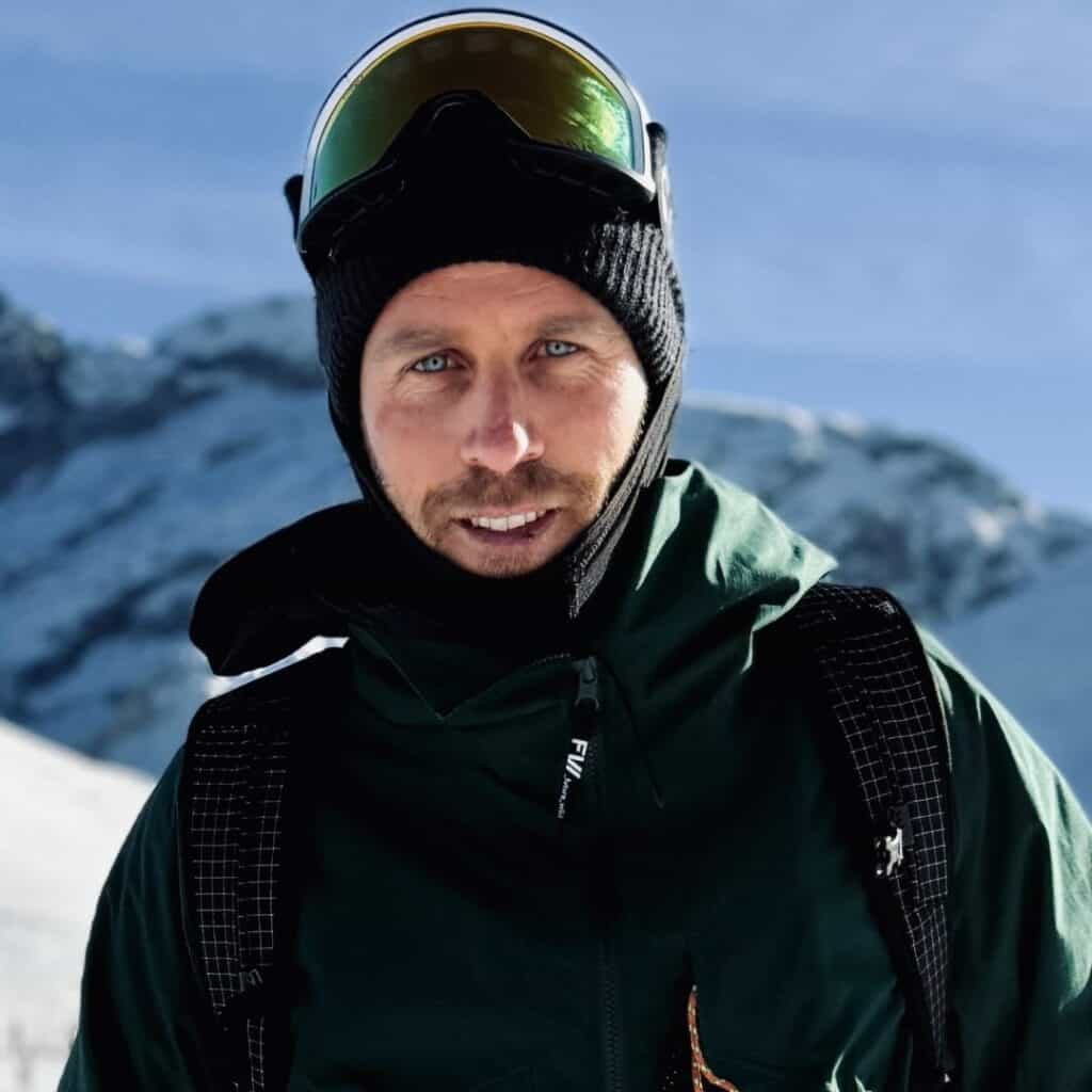 Max from Level Up with Max, independent ski and snowboard instructor in La Plagne, on the mountain in winter.