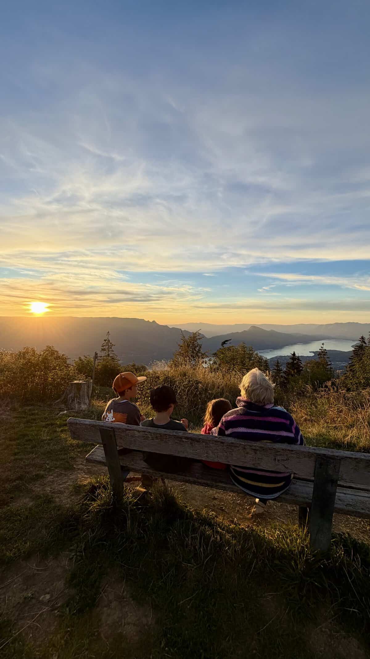 The sunset view from the Aire camper van parking at Le Site, Lac du Bourget, Chambery